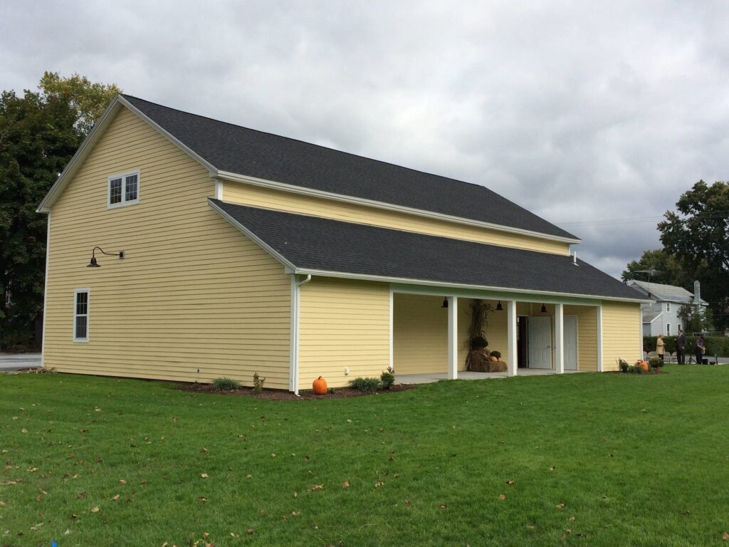 yellow house decorated for fall