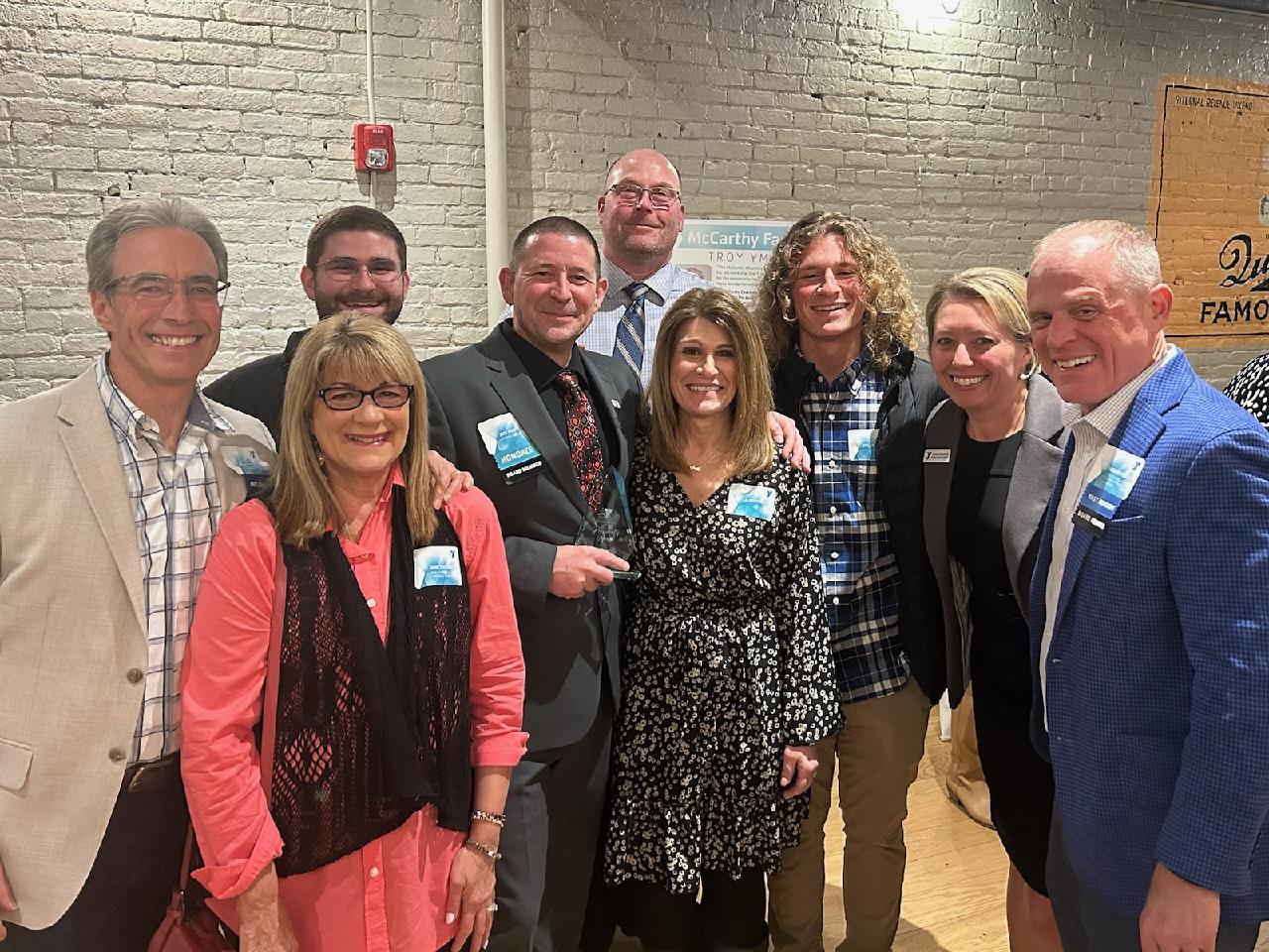 Jeff Marx, a Managing Environmental engineer with C.T. Male Associates poses with others at the Capital District's YMCA President's Awards for the Greenbush Branch